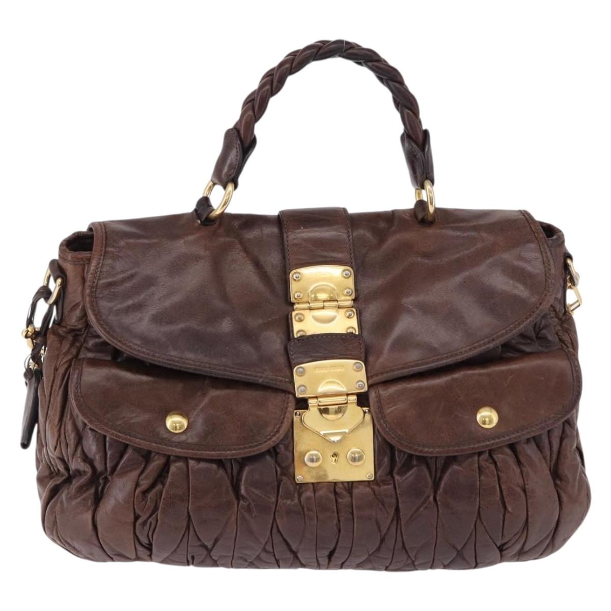 Borsa a mano Miu Miu Matelassé in pelle, modello 2 vie, marrone e oro, autentica ka5417 - Jerrillo image 2
